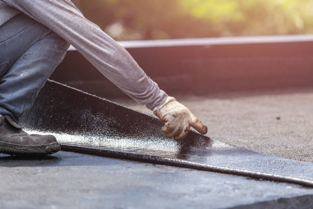 Professional Basement Waterproofing technician working in Pleasant Hill, PA